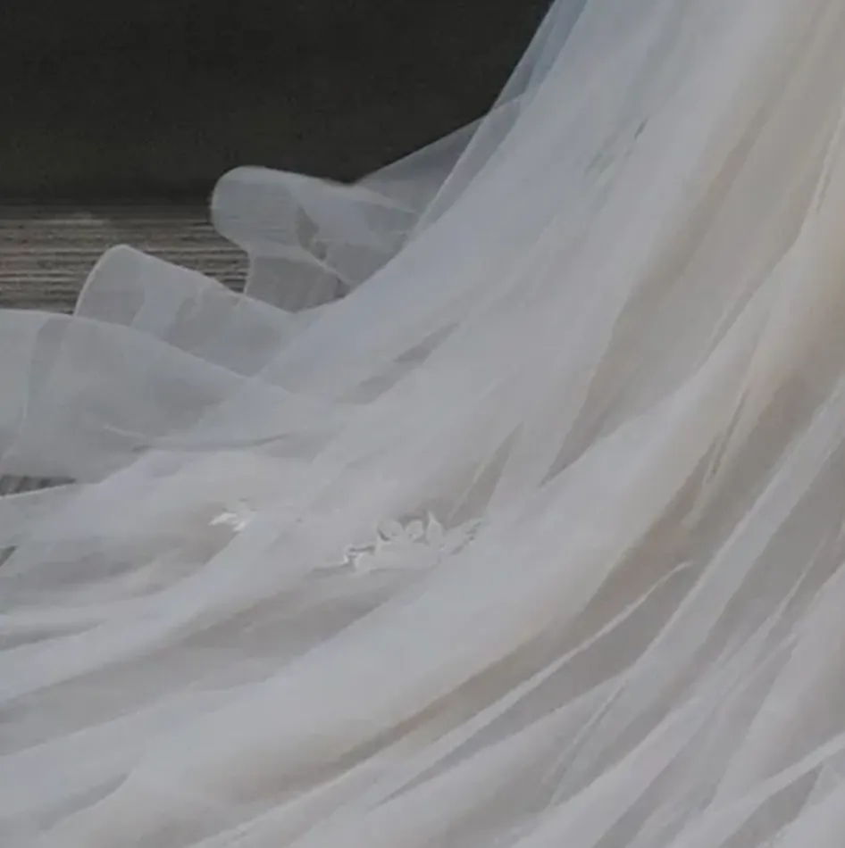 Off-The-Shoulder Lace And Tulle Bridal Gown With Sheer Bodice